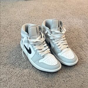 Air Jordan 1 Mid – light grey/white with black swoosh